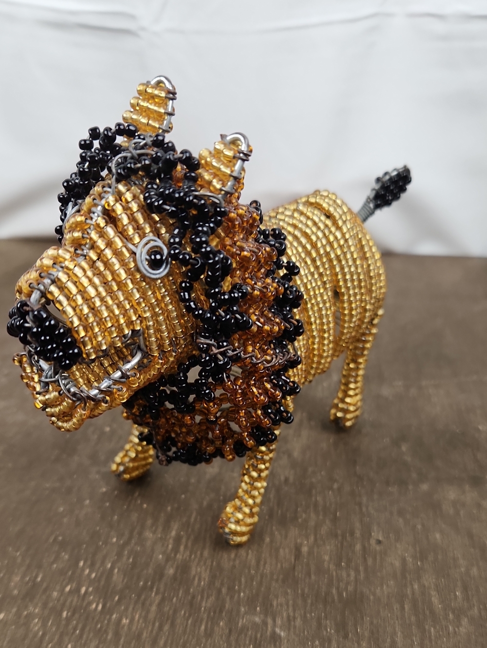 Handcrafted Beaded Lion Accent in Gold and Black